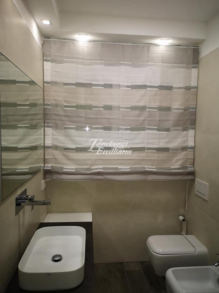 Tenda a pacchetto in bagno
